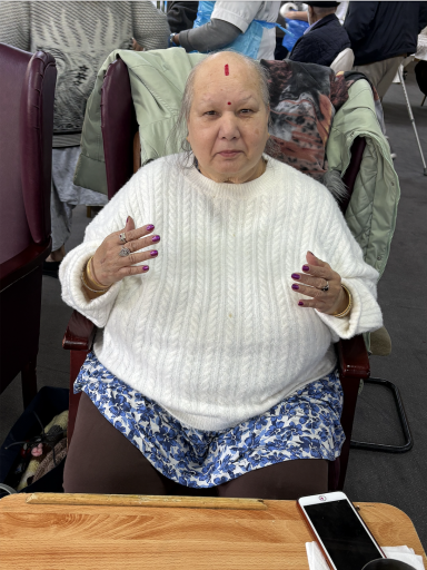Day Care Service user showing her freshly painted nails